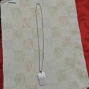 Strange Music logo symbol dogtag